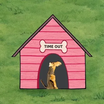 The pink Dog House, with a terrier sitting in the doorway