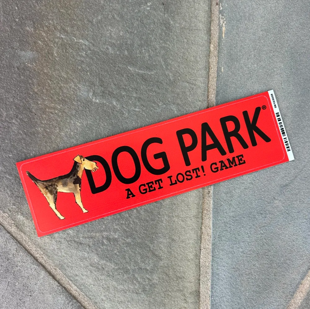 Red Dog Park car magnet on a slate patio